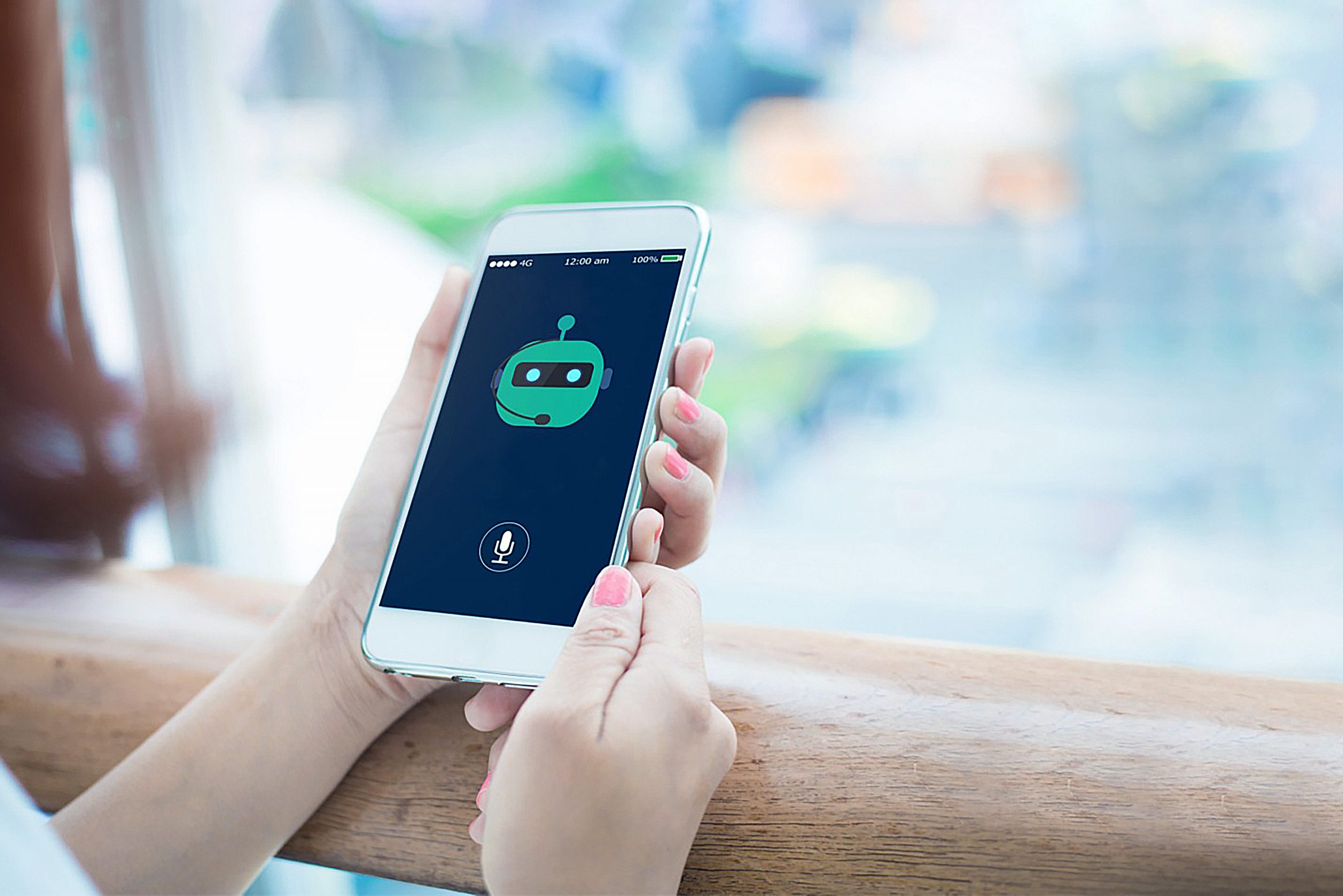 ey-woman-looking-at-mobile-chatbot